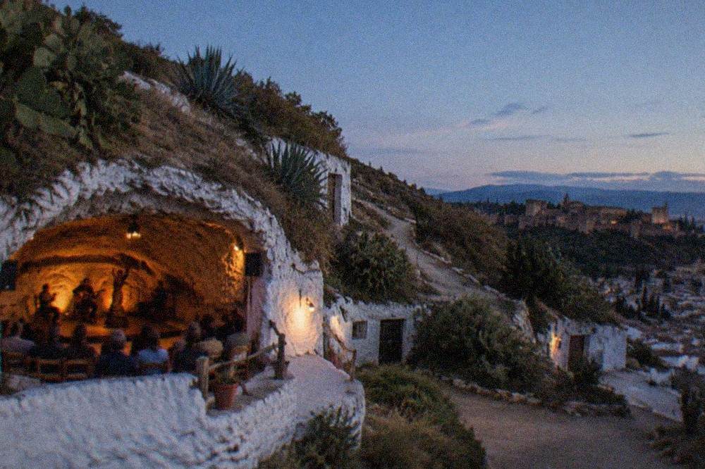 A cave flamenco venue in Sacromonte with an intimate performance space carved into the rock