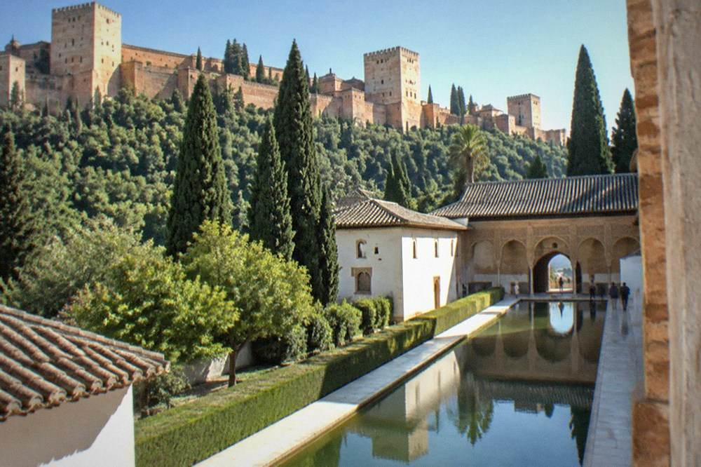 The long reflecting pool in the Court of the Myrtles inside the Comares Palace