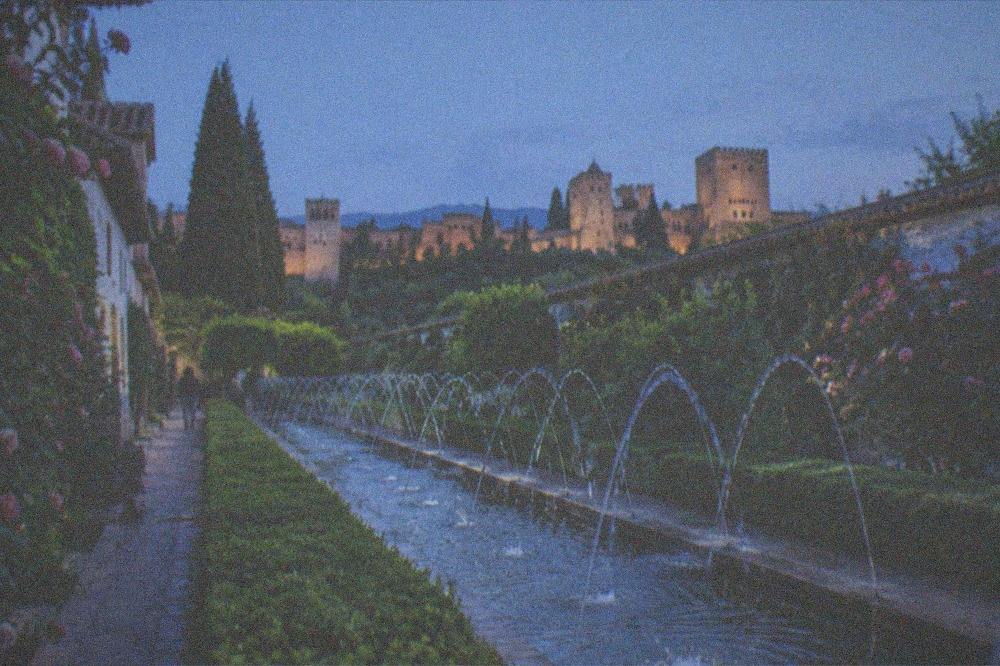 Water jets crossing in the long pool of the Generalife's Patio de la Acequia