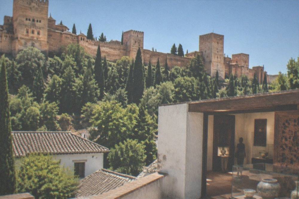 A gallery of Nasrid woodwork and ceramics on display in the Alhambra Museum