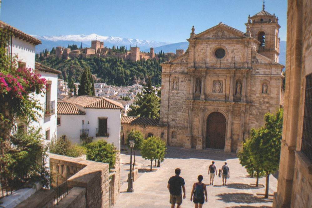 Travelers with backpacks walking through a sunlit plaza toward a renaissance church facade