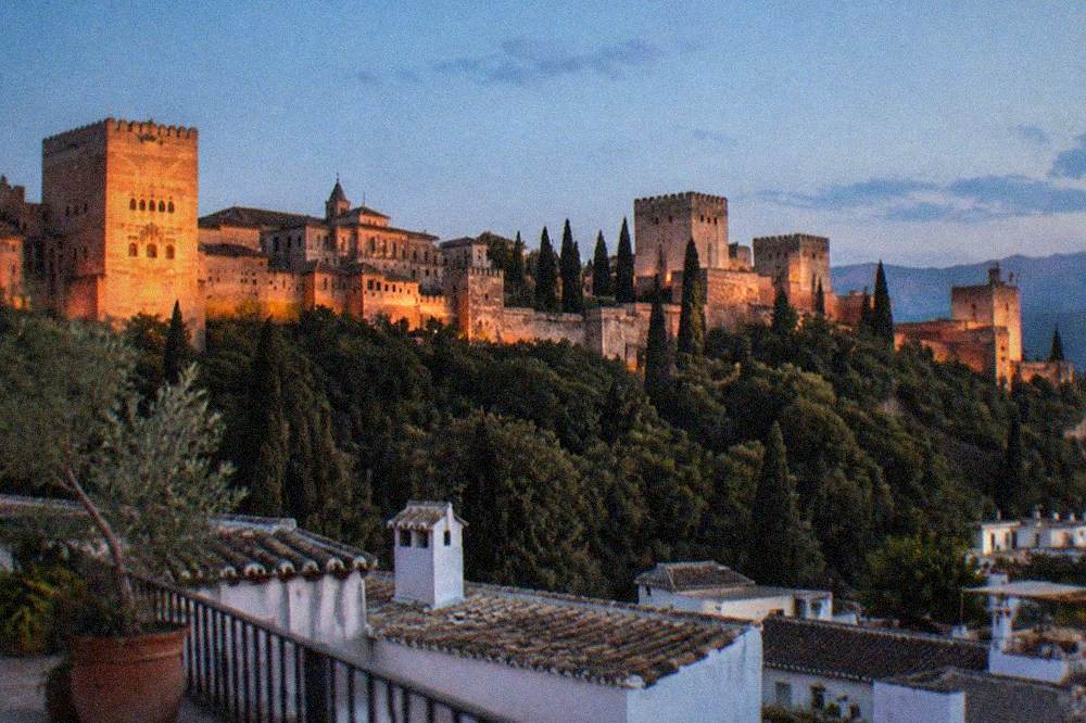 The Alhambra seen from a rooftop terrace in the Albaicin at sunset