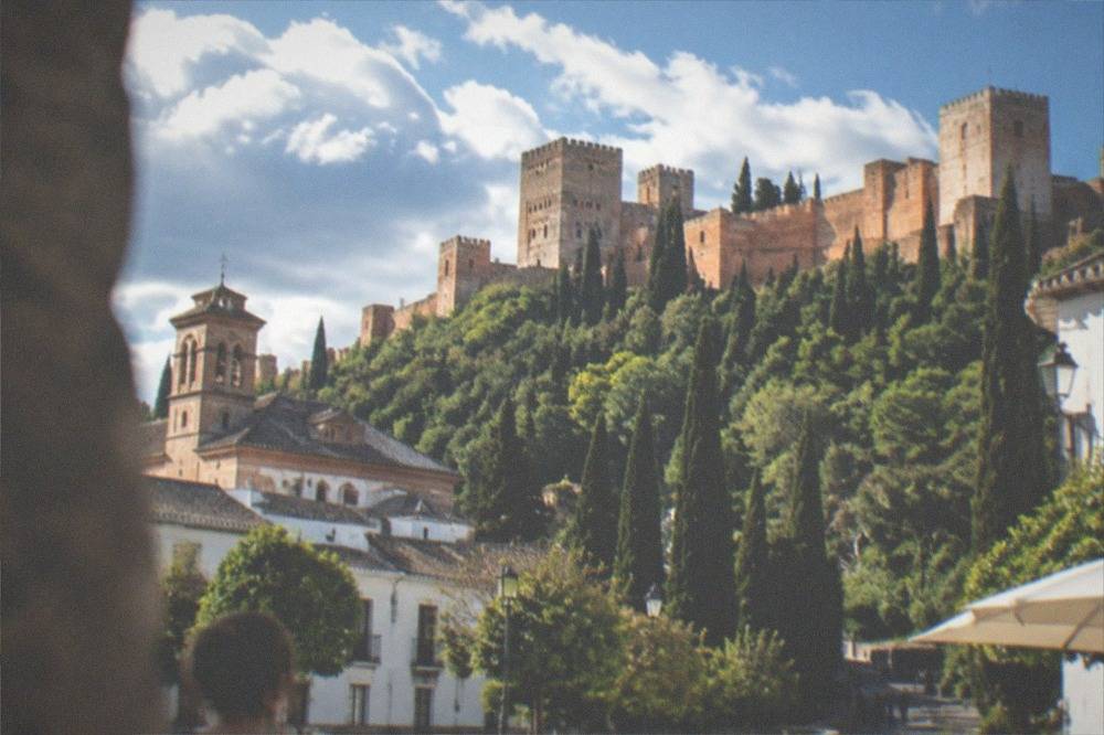 Plaza Nueva in Granada with the church of Santa Ana and the start of the road leading up to the Alhambra