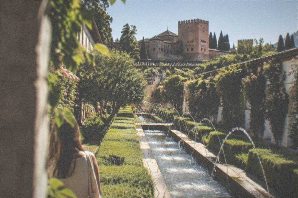 Water channels and trimmed hedges in the gardens of the Generalife above Granada