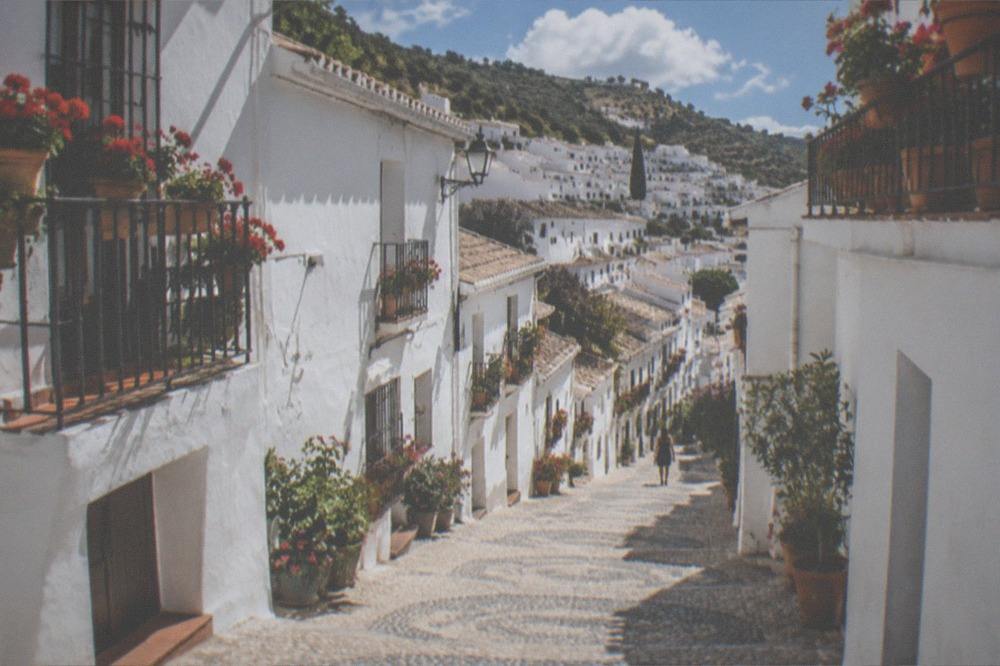 Whitewashed houses and steep alleys of Frigiliana village above the Costa del Sol